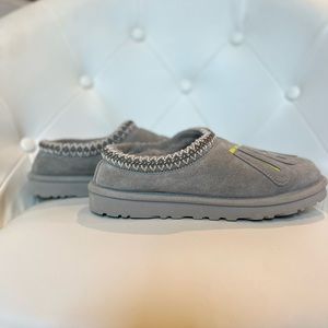 UGG gray and neon ugg slippers. (women’s 9, men’s 7)